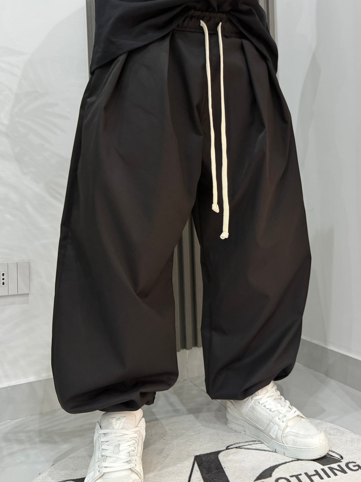 Baggy tecnico con lacci